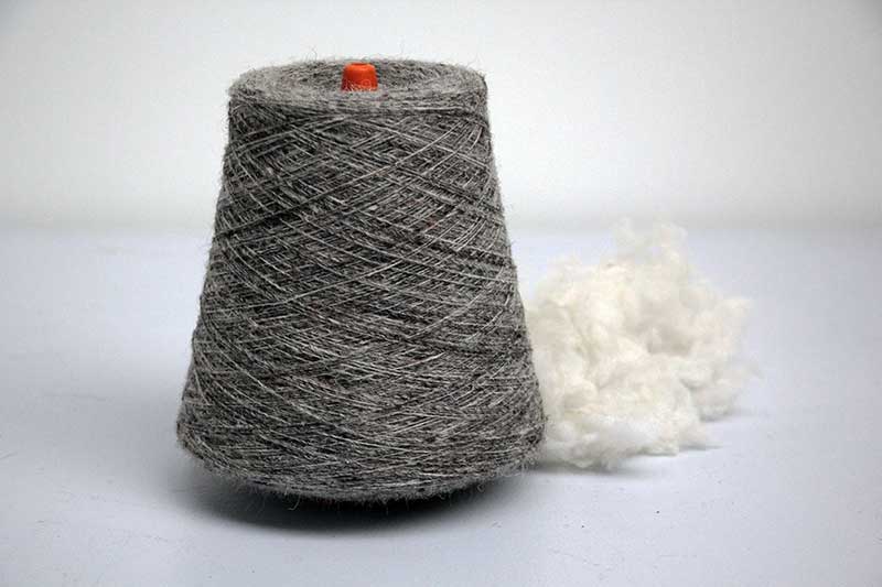 Grey wool on spindle Uist Wool