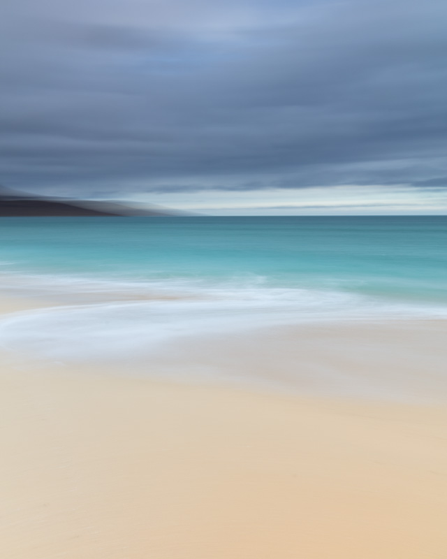 In Balance - Impressionist image of Tràigh Scarista on the Isle of Harris. Taken not long after sunrise in February 2017, the lilac tones in the sky are gorgeous against the aqua and white sea and the light sand. Scarista Beach is possibly my favourite spot on Harris. It speaks to me and this image recreates the feeling of an almost dreamlike calm, balance and contentment that I get when I spend time there.