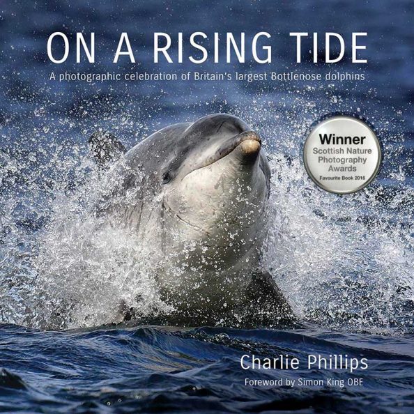 On a Rising Tide book about bottlenose dolphins - Charlie Phillips