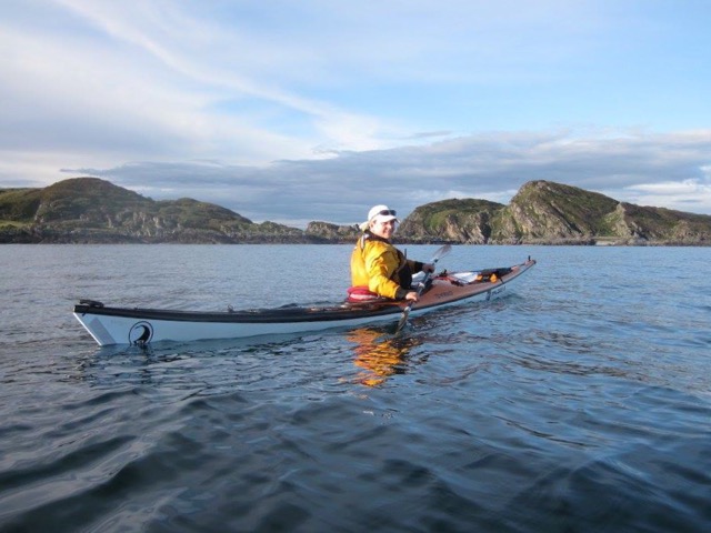 Sea kayaking Scotland - Alice paddling near the Garvellachs Oban - Sea Kayak Alice