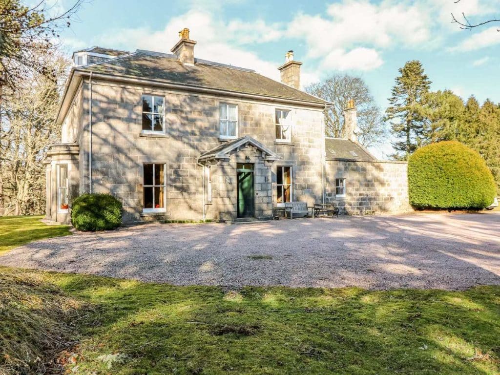 mansion surrounded by trees - Inverallan House