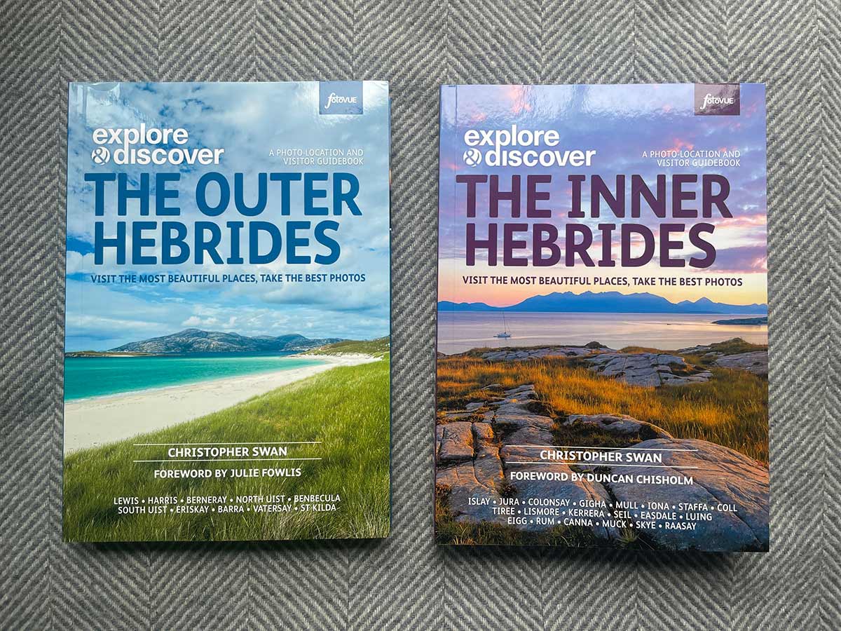 Outer and Inner Hebrides guide books on Harris tweed material