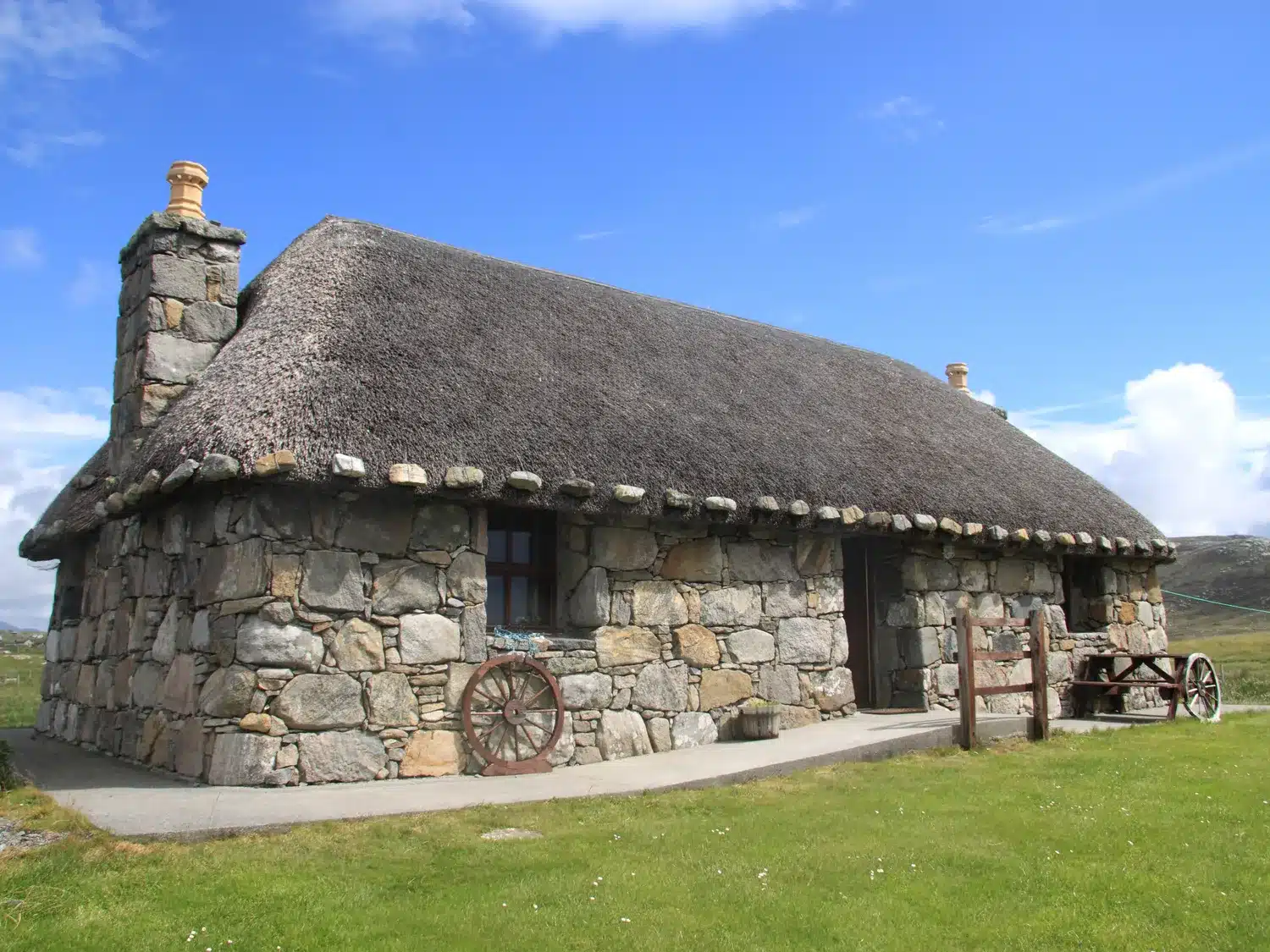 traditional stone built thatched croft cottage Smiddy Cottage South Uist