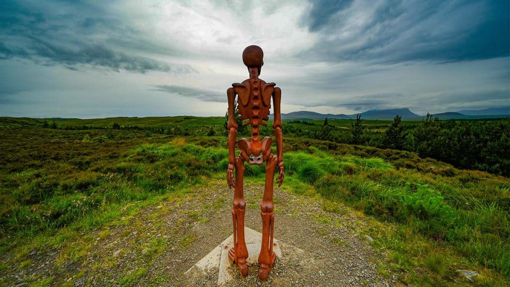 The Unknown iron skeleton statue overlooking moor